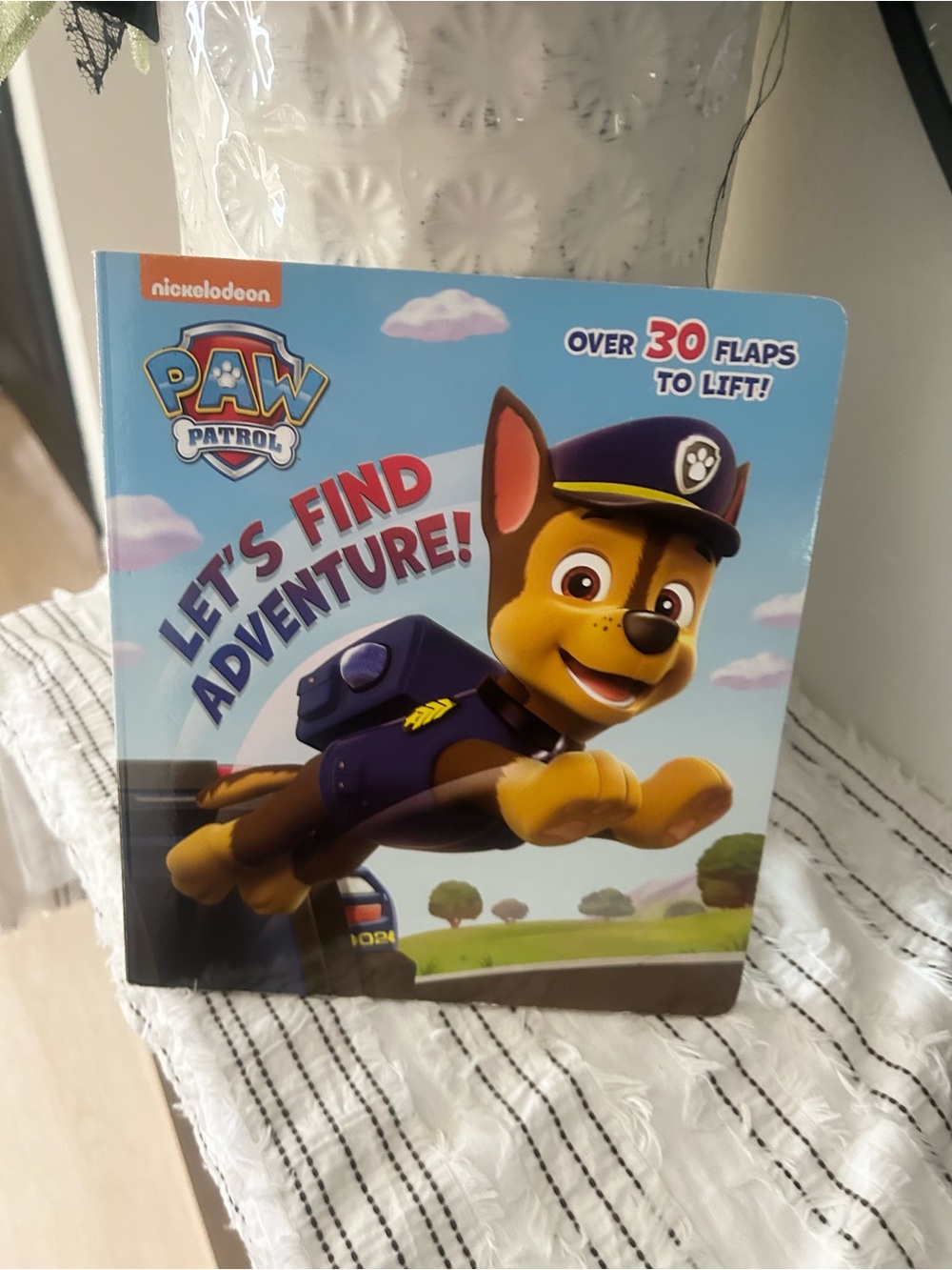 PAW Patrol Let’s Find Adventure Lift the Flap Board Book